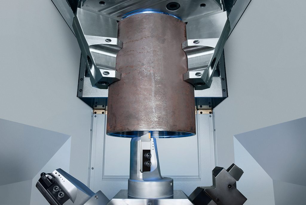 Close-up of the vertical work area of a VSC 500 machine with bottom-mounted turret and chuck for socket machining