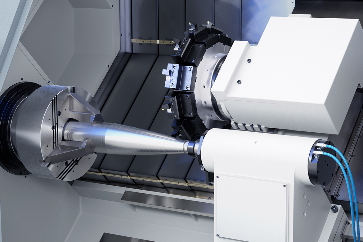 The USC 850 during the precision machining of a 155 mm artillery shell casing, optimally supported by a hydraulic tailstock.