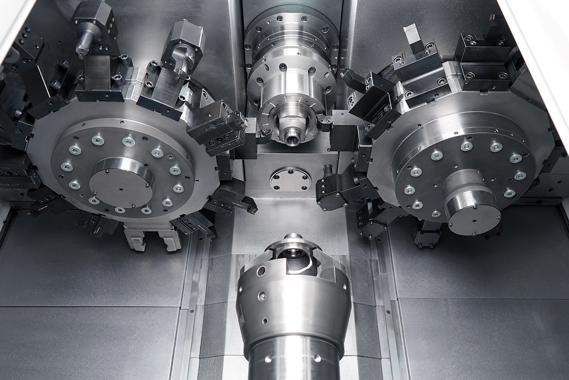 Área de trabajo de la VT 200 con dos torretas y contrahusillo para un mecanizado paralelo y tiempos de ciclo reducidos.